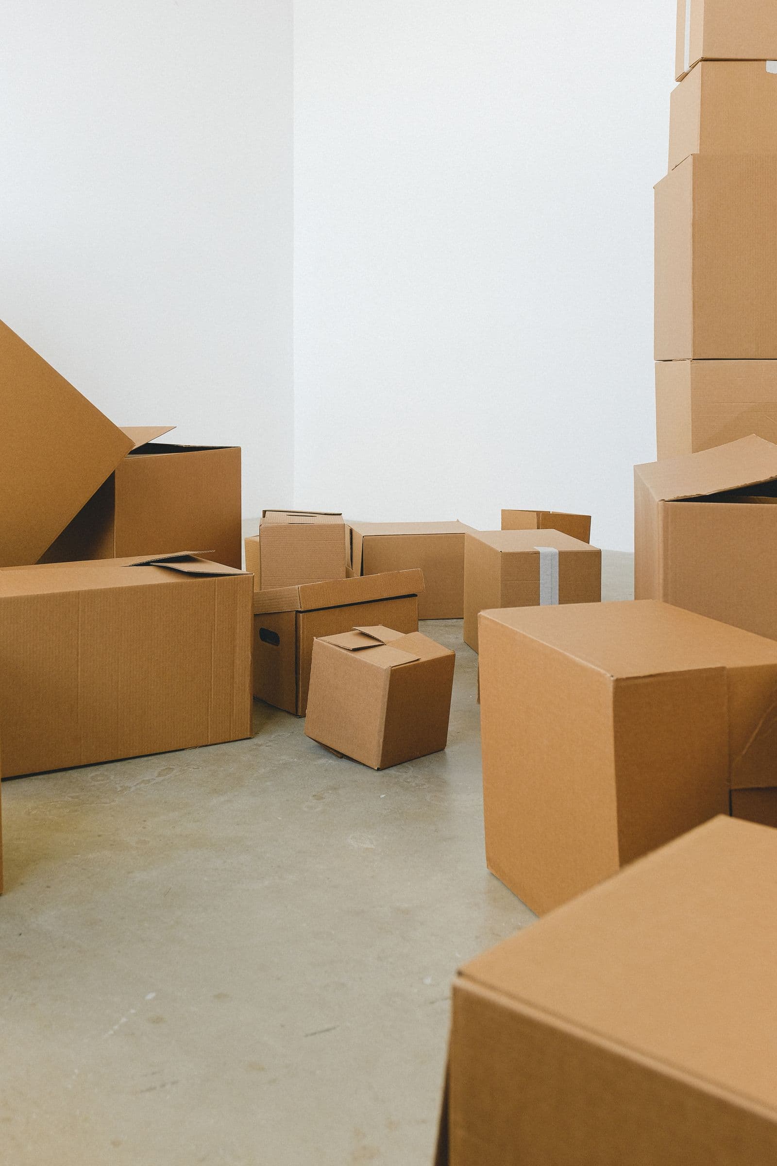 Stacked moving boxes in an Orange County home ready for relocation